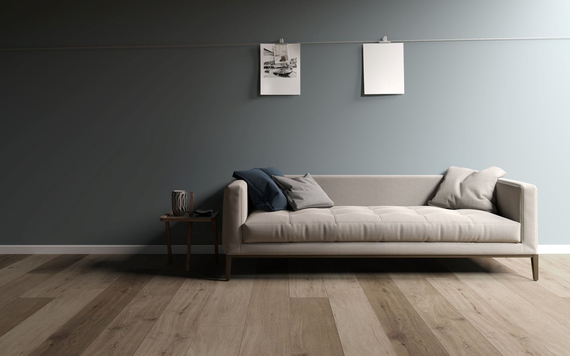 Modern living room with a long sofa against a gray wall, Hybri flooring